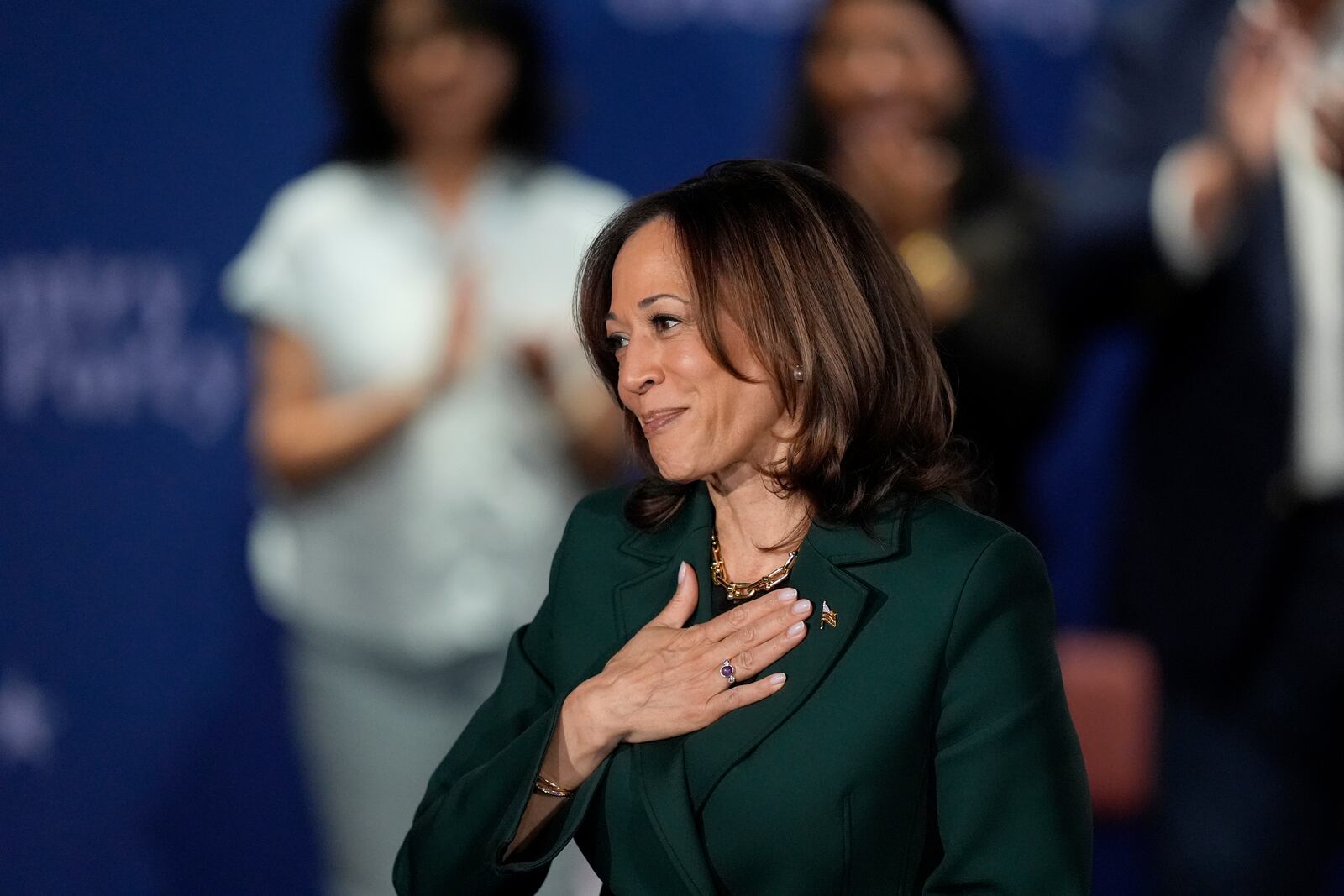 Democratic presidential nominee Vice President Kamala Harris gestures during a town hall at the Royal Oak Theatre in Royal Oak, Mich., Monday, Oct. 21, 2024. (AP Photo/Carlos Osorio)