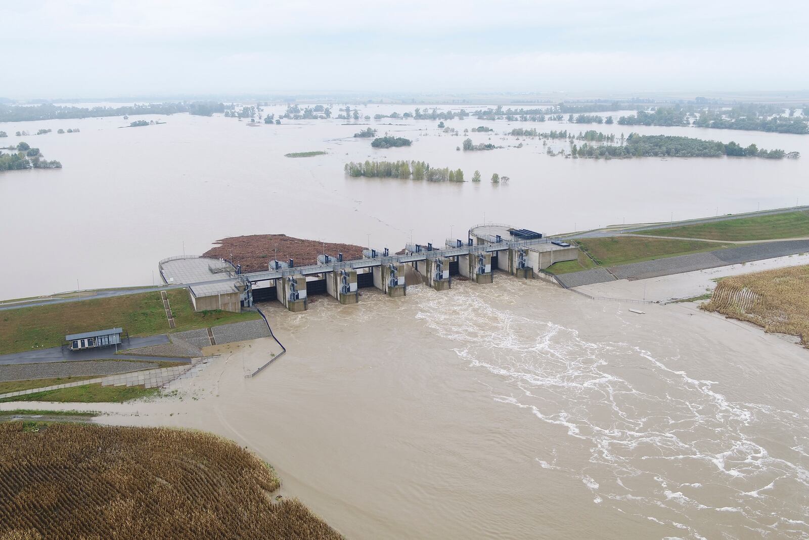 This photo provided by the state company Polish Waters shows the Oder River flood waters channelled into and contained by the newly-built Lower Raciborz Reservoir that has spared the cities of Opole and Wroclaw from flooding, in Raciborz, southwestern Poland, Sept. 16, 2024. (Polish Waters via AP)