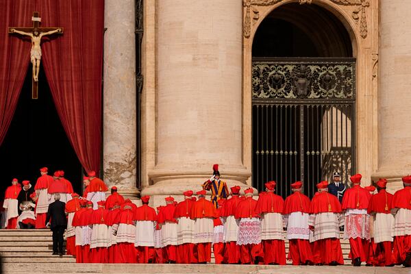 FILE - Cardinals walk through St. Peter's Square ahead of Pope Francis' coffin at the Vatican, Wednesday, April 23, 2025. (AP Photo/Andreea Alexandru, File)