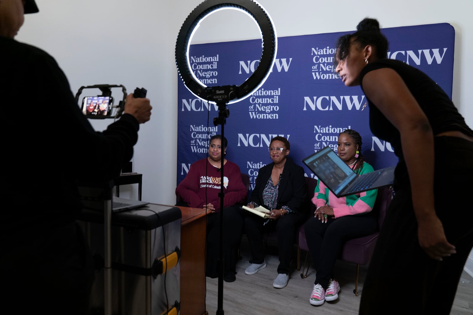 Members of the Black Women's Leadership Collective from left; Holli Holliday, President, Sisters Lead Sisters Vote & lead organizer, Win With Black Women, Portia Reddick White, Vice President Advocacy and Policy, National Council of Negro Women (NCNW) and Roslyn Brock, Chairman Emeritus, NAACP, share election updates and voting information in battleground communities via livestream at the national Council of Negro Women in Washington, Tuesday, Nov. 5, 2024. (AP Photo/Jose Luis Magana)