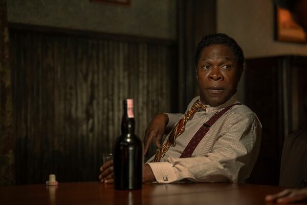 This image released by Netflix shows Michael Potts in a scene from "The Piano Lesson." (David Lee/Netflix via AP)