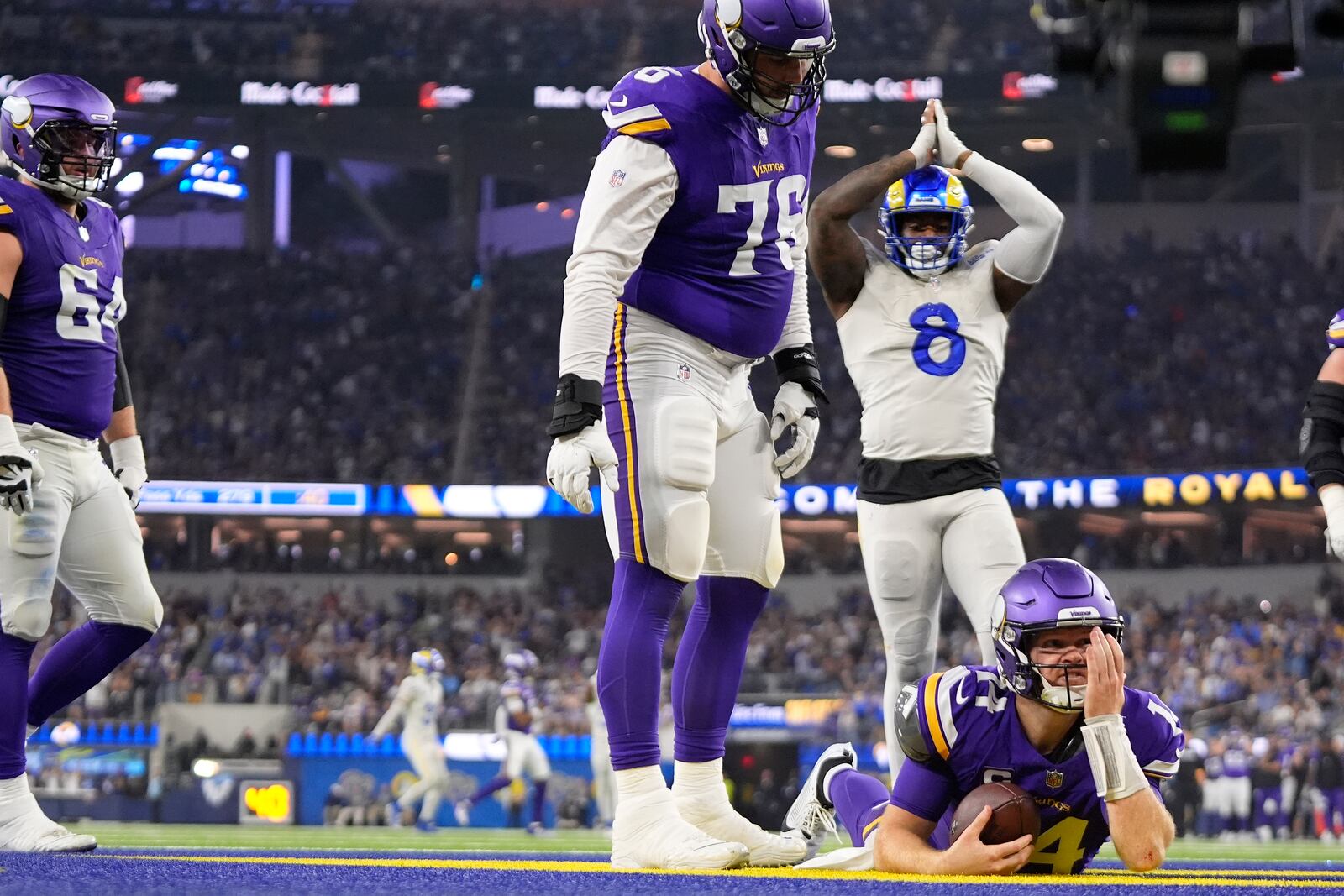 Minnesota Vikings quarterback Sam Darnold (14) reacts after being sacked for a safety by Los Angeles Rams linebacker Byron Young (not shown) during the second half of an NFL football game, Thursday, Oct. 24, 2024, in Inglewood, Calif. (AP Photo/Mark J. Terrill)