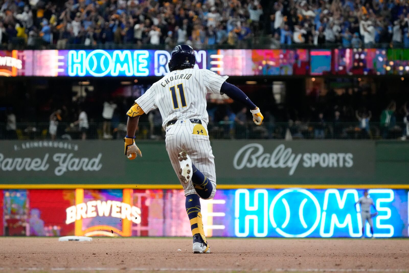 Milwaukee Brewers' Jackson Chourio reacts after hitting a home run during the eighth inning of Game 2 of a National League wild card baseball game against the New York Mets Wednesday, Oct. 2, 2024, in Milwaukee. (AP Photo/Morry Gash)