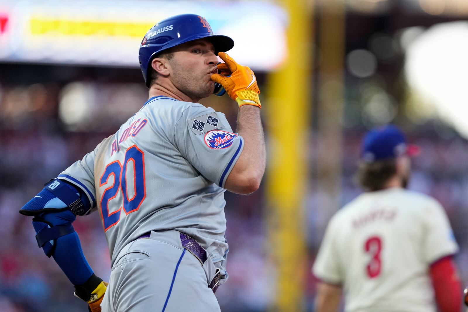 New York Mets' Pete Alonso reacts after hitting a home run against Philadelphia Phillies pitcher José Ruiz during the sixth inning of Game 2 of a baseball NL Division Series, Sunday, Oct. 6, 2024, in Philadelphia. (AP Photo/Matt Slocum)