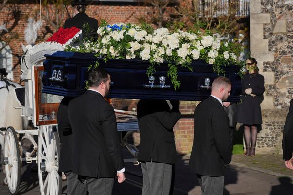 Pallbearers carry the coffin into the funeral service of One Direction singer Liam Payne at St Mary's Church in Amersham, England, Wednesday, Nov. 20, 2024. (Jonathan Brady/PA via AP)