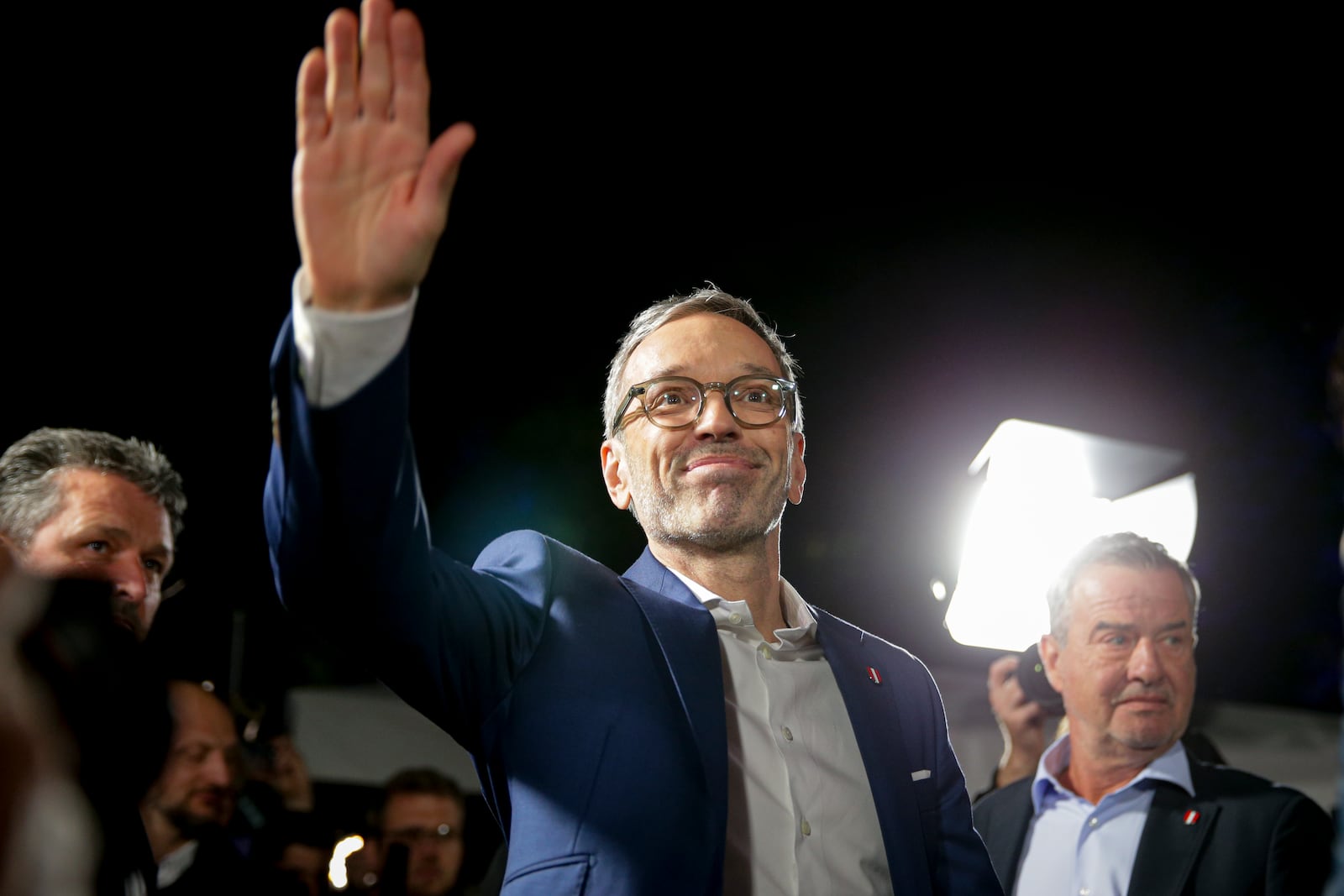 Herbert Kickl, leader of the Freedom Party of Austria waves to supporters, in Vienna, Austria, Sunday, Sept. 29, 2024, after polls closed in the country's national election. (AP Photo/Heinz-Peter Bader)