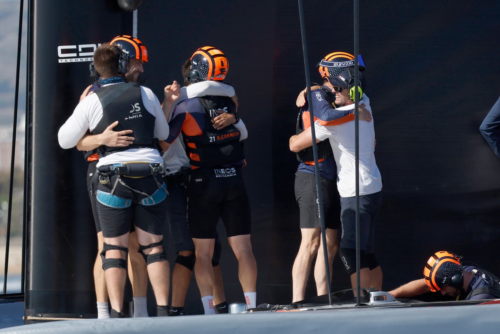 INEOS Britannia crew celebrate their victory against the Luna Rosa Prada Pirelli's sailing team during the Louis Vuitton Cup Final Day 7 at the Barcelona's coast, Spain, Friday, Oct. 4, 2024. (AP Photo/Joan Monfort)