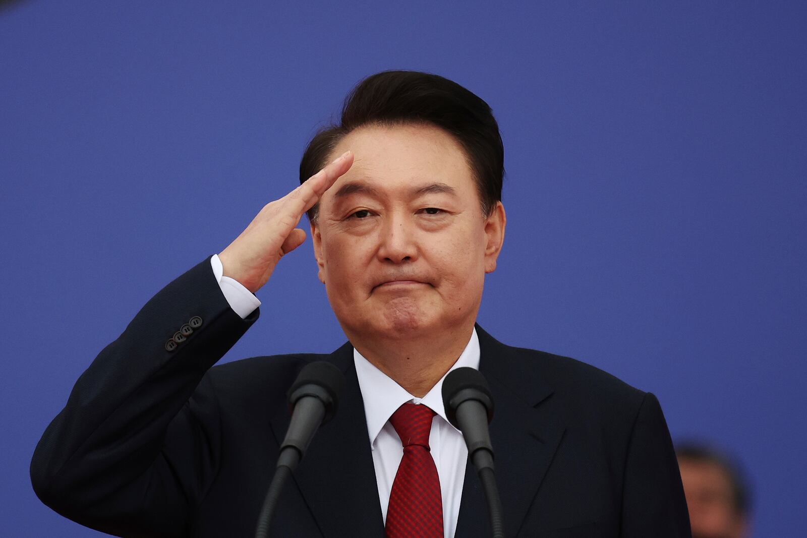 South Korean President Yoon Suk Yeol salutes after delivering his speech during a celebration to mark the 76th anniversary of Korea Armed Forces Day in Seongnam, South Korea Tuesday, Oct. 1, 2024. (Kim Hong-Ji/Pool Photo via AP)