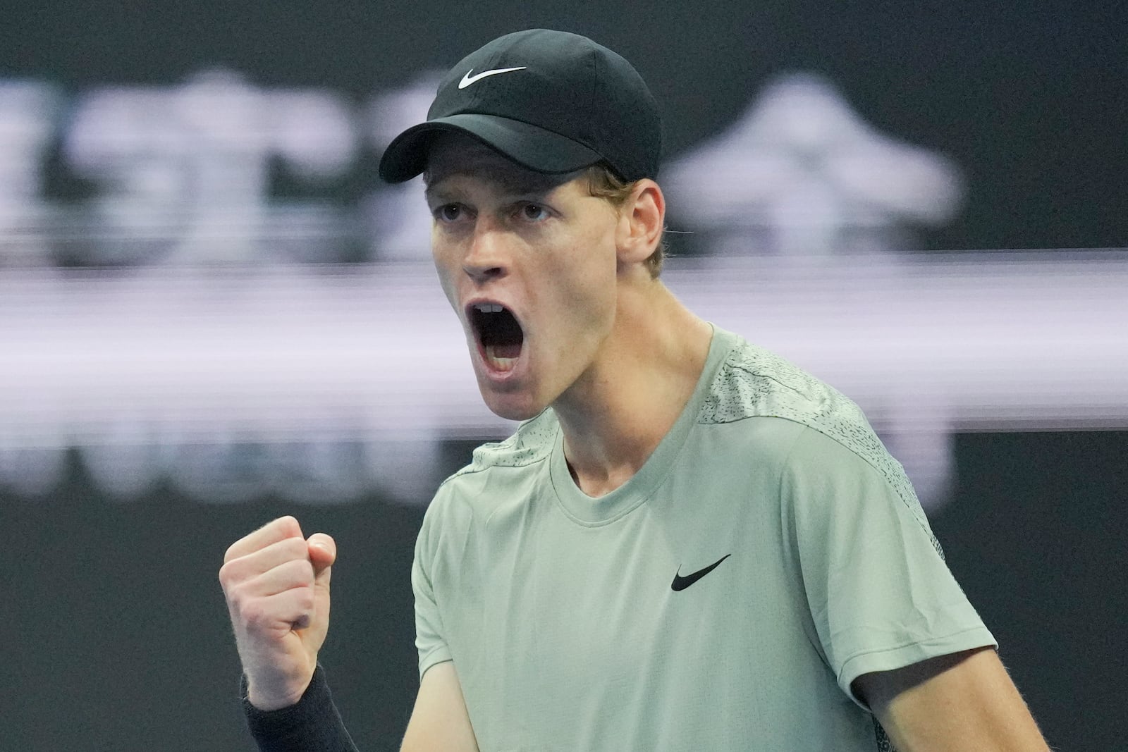 Jannik Sinner of Italy reacts during their men's singles finals match against Carlos Alcaraz of Spain at the China Open tennis tournament, National Tennis Center in Beijing, Wednesday, Oct. 2, 2024. (AP Photo/Achmad Ibrahim)