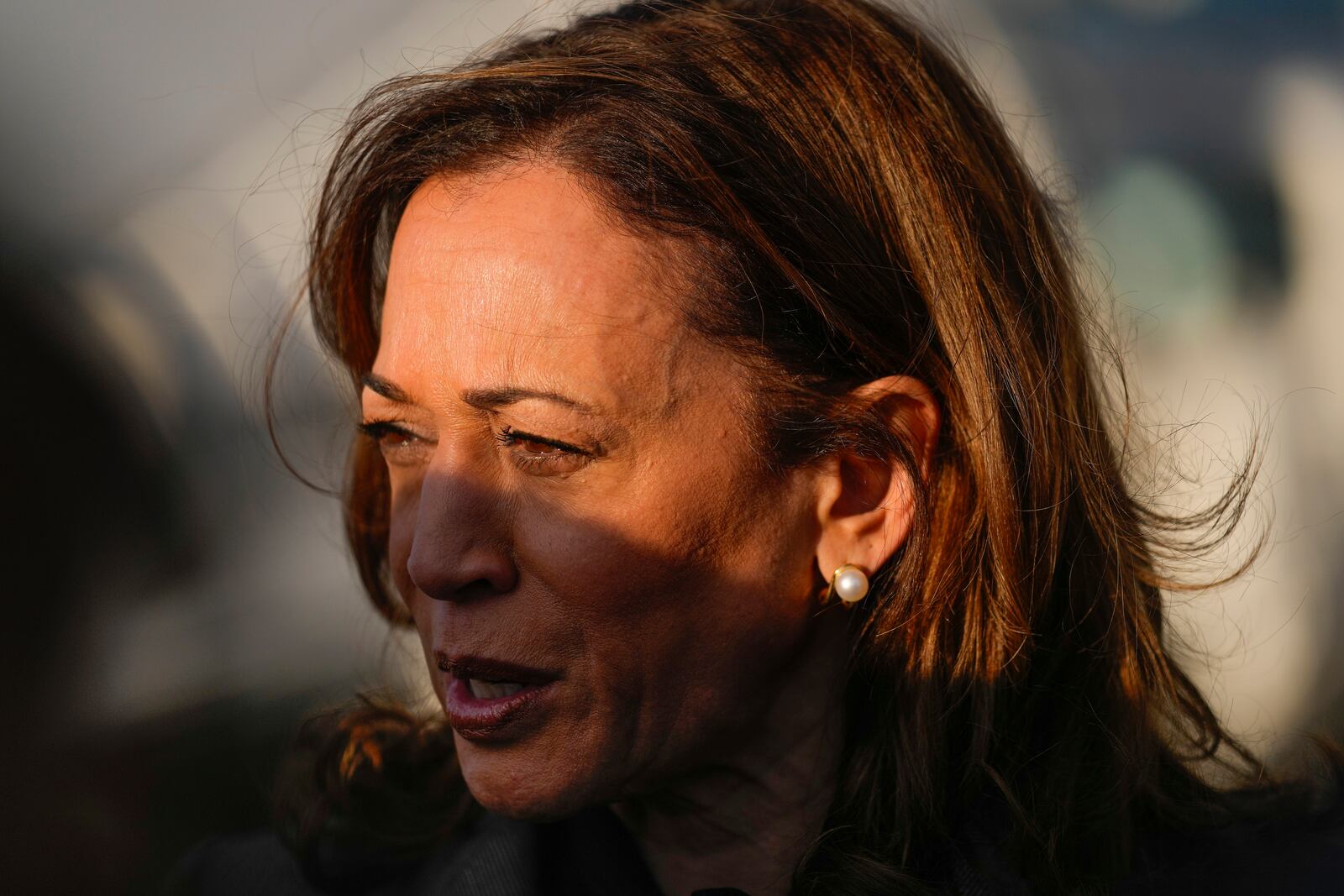 Democratic presidential nominee Vice President Kamala Harris speaks to members of the media upon her arrival at Andrews Air Force Base, Md., Sunday, Sept. 22, 2024. (AP Photo/Matt Rourke/Pool)