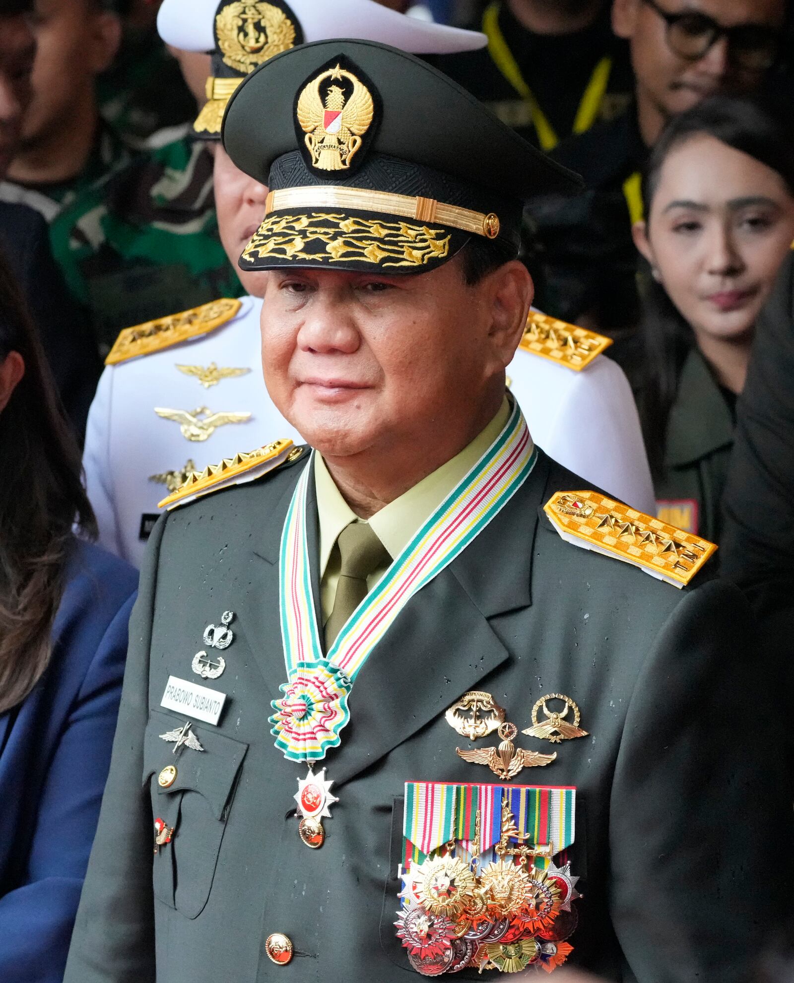 FILE - Indonesian Defense Minister Prabowo Subianto pauses after being awarded honorary rank of four-star general by President Joko Widodo during a ceremony at the Armed Forces Headquarters in Jakarta, Indonesia, Wednesday, Feb. 28, 2024. (AP Photo/Achmad Ibrahim, File)