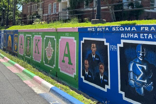 Murals celebrating historically Black fraternities and sororities decorate the campus of Florida AM University in Tallahassee, Fla., Wednesday, May 14, 2025. (AP Photo/Kate Payne)
