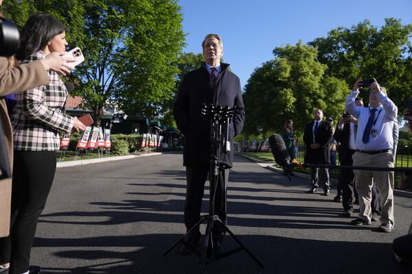 Treasury Secretary Scott Bessent speaks with reporters outside the White House, Monday, April 28, 2025, in Washington. (AP Photo/Mark Schiefelbein)