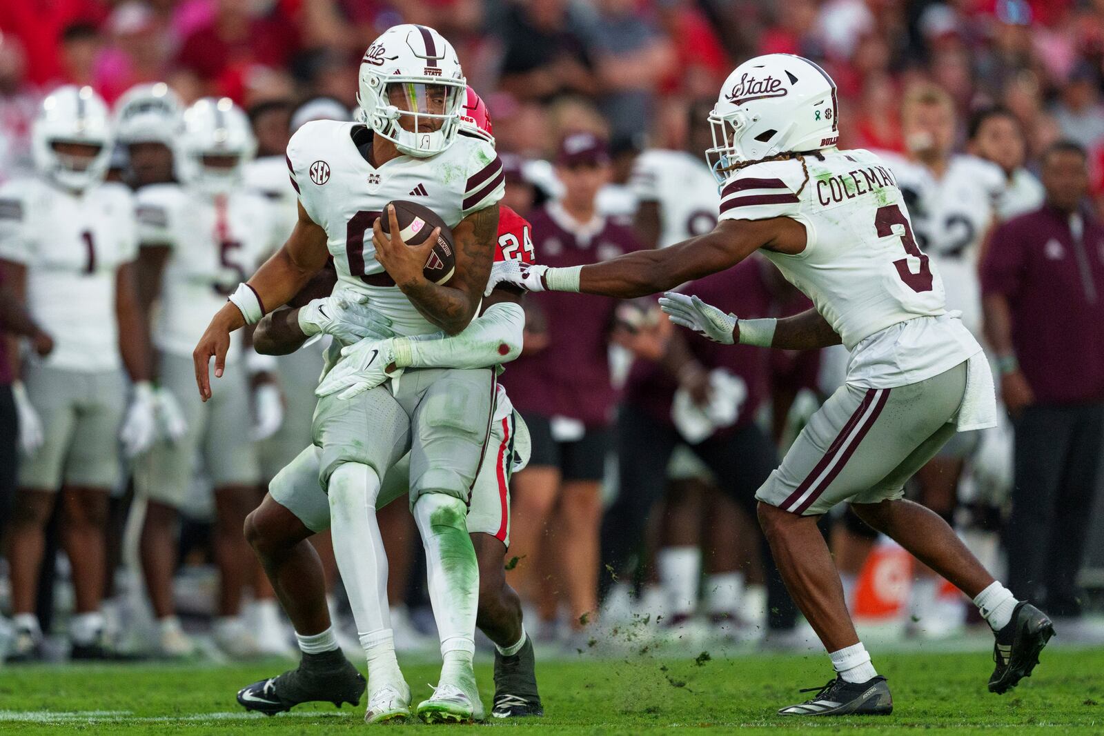 Mississippi State quarterback Michael Van Buren Jr. (0) is wrapped up by Georgia defensive back Malaki Starks (24) during an NCAA college football game, Saturday, Oct. 12, 2024, in Athens, Ga. (AP Photo/Jason Allen)