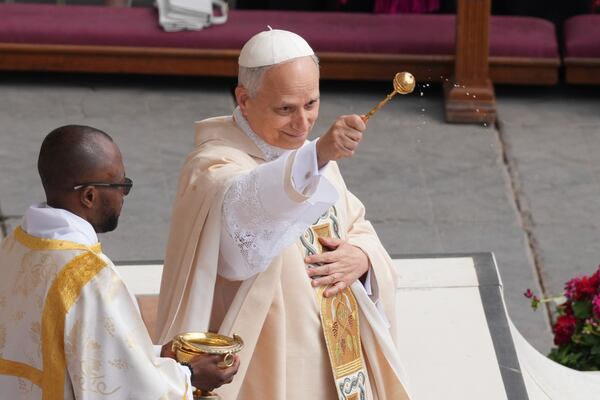 Pope Leo XIV celebrates a Mass for the formal inauguration of his pontificate, in St. Peter's Square attended by heads of state, royalty and ordinary faithful, Sunday, May 18, 2025. (AP Photo/Stefano Costantino)