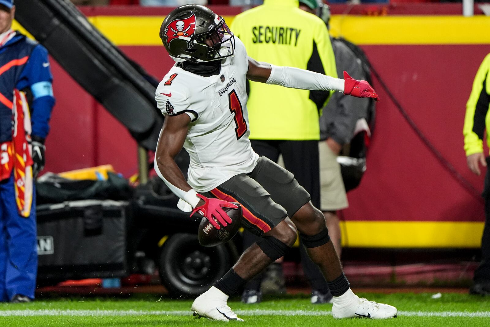 Tampa Bay Buccaneers running back Rachaad White (1) celebrates his touchdown against the Kansas City Chiefs during the first half of an NFL football game, Monday, Nov. 4, 2024, in Kansas City, Mo. (AP Photo/Charlie Riedel)