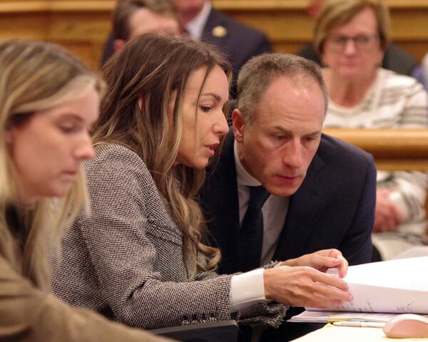 Karen Read confers with attorney David Yannetti during her trial at Norfolk Superior Court in Dedham, Mass., Friday, May 2, 2025. (Mark Jarret Chavous/The Enterprise via AP, Pool)
