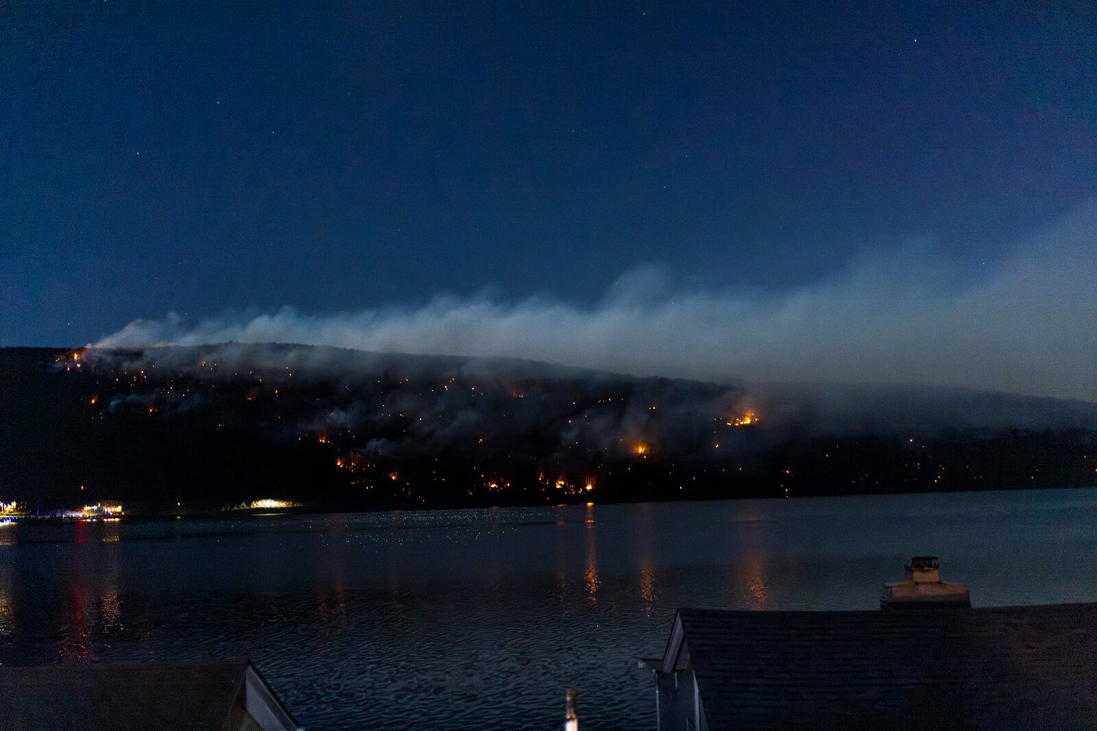 Wildfires burn along the New York and New Jersey border in Greenwood Lake, New York, Wednesday, Nov. 13, 2024. (AP Photo/Eduardo Munoz Alvarez)