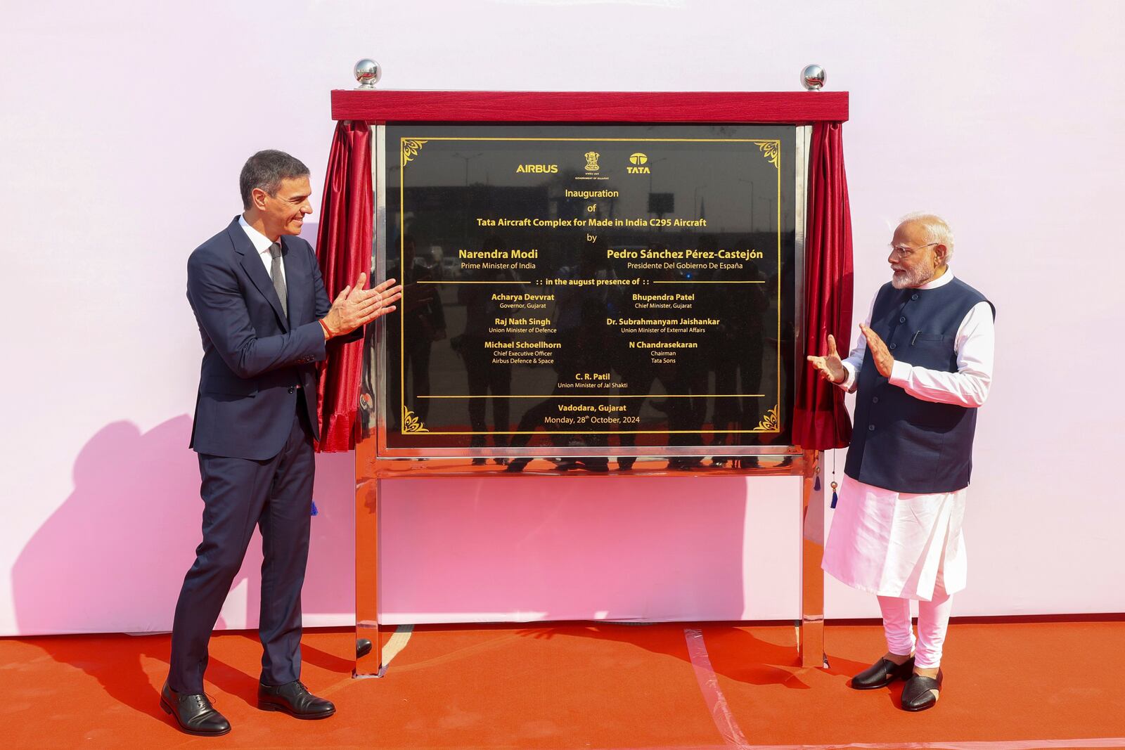 In this photo provided by the Gujarat state Press Information Bureau, Indian Prime Minister Narendra Modi, right, and his Spanish counterpart Pedro Sanchez inaugurate Tata Aircraft complex for made in India C-295 aircraft in Vadodara, India, Monday, Oct. 28, 2024. (Gujarat State Press Information Bureau via AP)