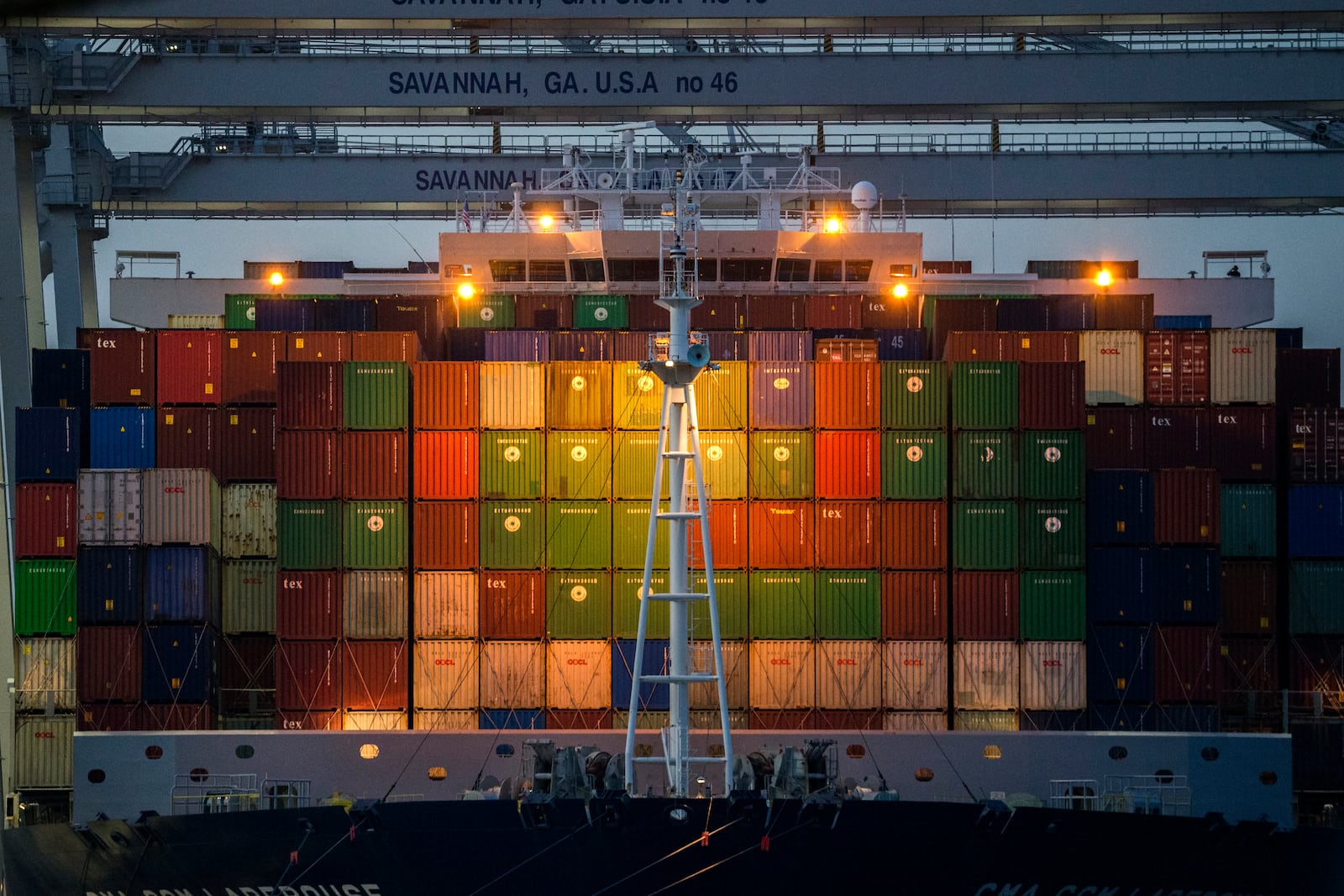 FILE - Ship to shore cranes work the container ship CMA CGM Laperouse at the Georgia Ports Authority's Port of Savannah, Sept. 29, 2021, in Savannah, Ga. (AP Photo/Stephen B. Morton, File)