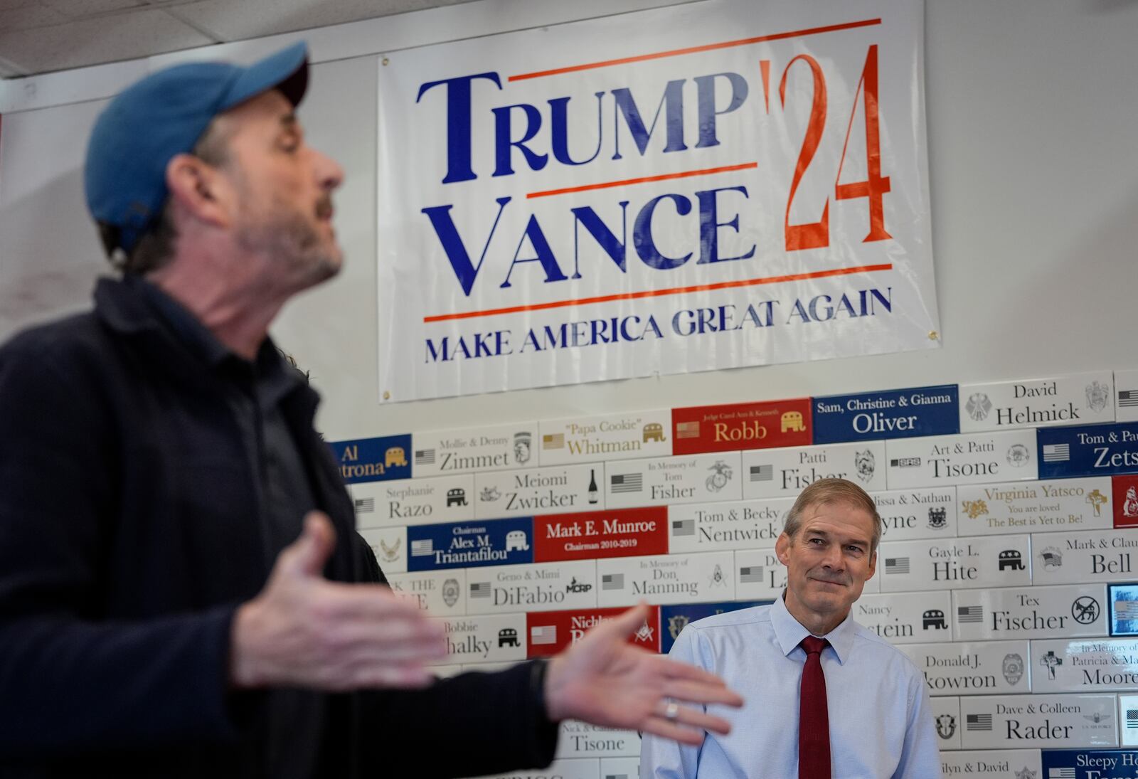 Rep. Jim Jordan, R-Ohio, right, looks to Rep. Michael Rulli, R-Ohio, left, as he speaks at a rally at the Mahoning County Republican Party headquarters in Boardman, Ohio, Thursday, Oct. 17, 2024. (AP Photo/Carolyn Kaster)