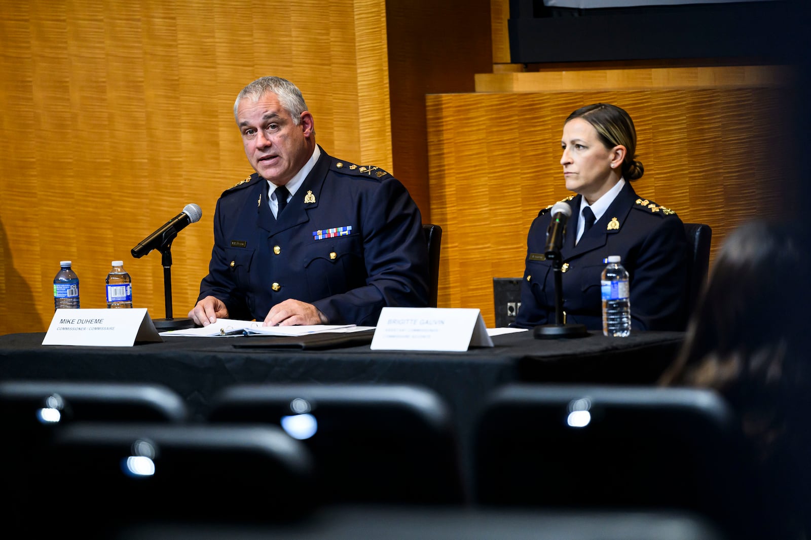 RCMP Commissioner Mike Duheme, left, and Assistant Commissioner Brigitte Gauvin participate in a news conference at RCMP National Headquarters in Ottawa, Ontaio, Monday, Oct. 14, 2024. (Justin Tang/The Canadian Press via AP)