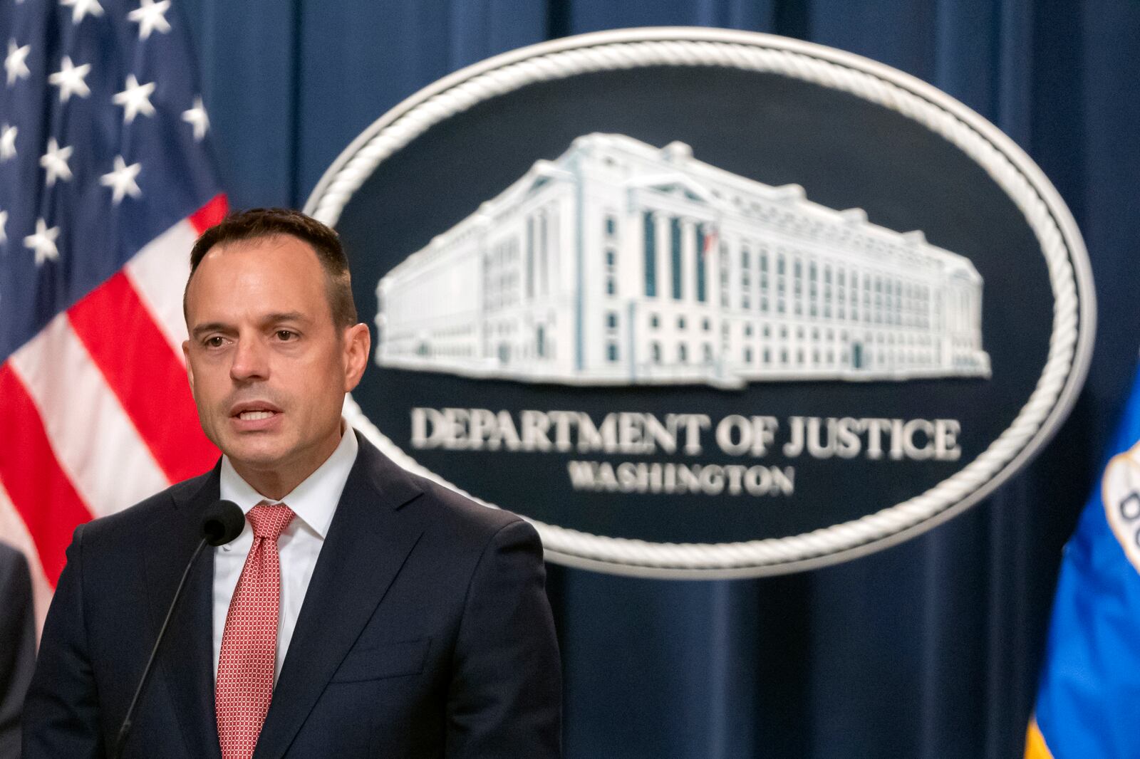 Principal Deputy Associate Attorney General Benjamin Mizer speaks during a news conference at the Department of Justice, Tuesday, Sept. 24, 2024, in Washington. (AP Photo/Mark Schiefelbein)