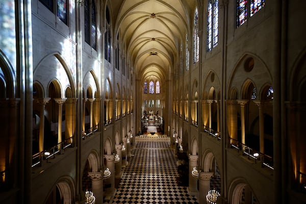 The nave of the Notre-Dame de Paris cathedral is seen while French President Emmanuel Macron visited the restored interiors of the monument, Friday, Nov. 29, 2024 in Paris. (Sarah Meyssonnier/Pool via AP)