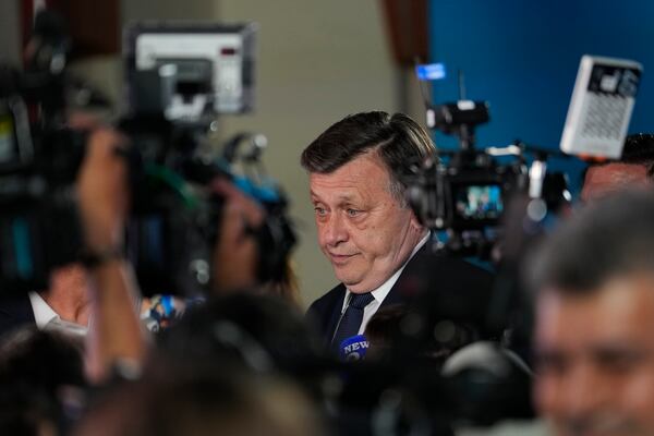 Presidential candidate Crin Antonescu speaks to media during a meeting with supporters after polls closed for the first round of the country's presidential election redo in Bucharest, Romania, Sunday, May 4, 2025. (AP Photo/Vadim Ghirda)