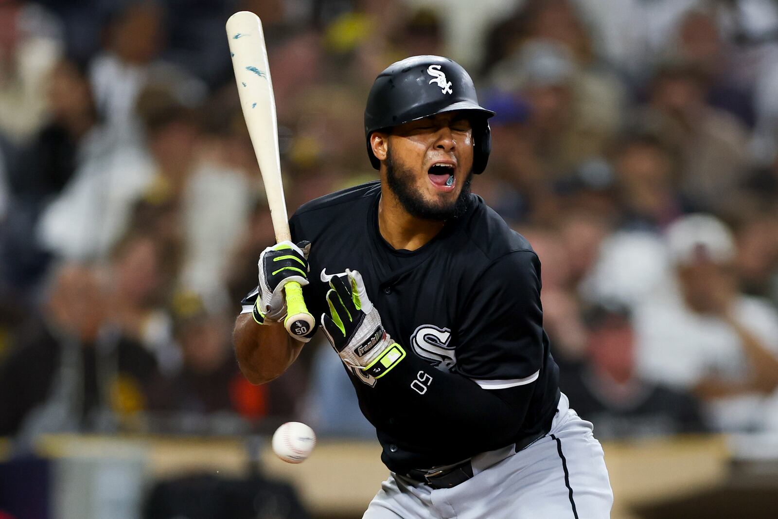 Chicago White Sox's Lenyn Sosa reacts after being hit by a pitch from San Diego Padres relief pitcher Jason Adam during the eighth inning of a baseball game, Saturday, Sept. 21, 2024, in San Diego. (AP Photo/Ryan Sun)