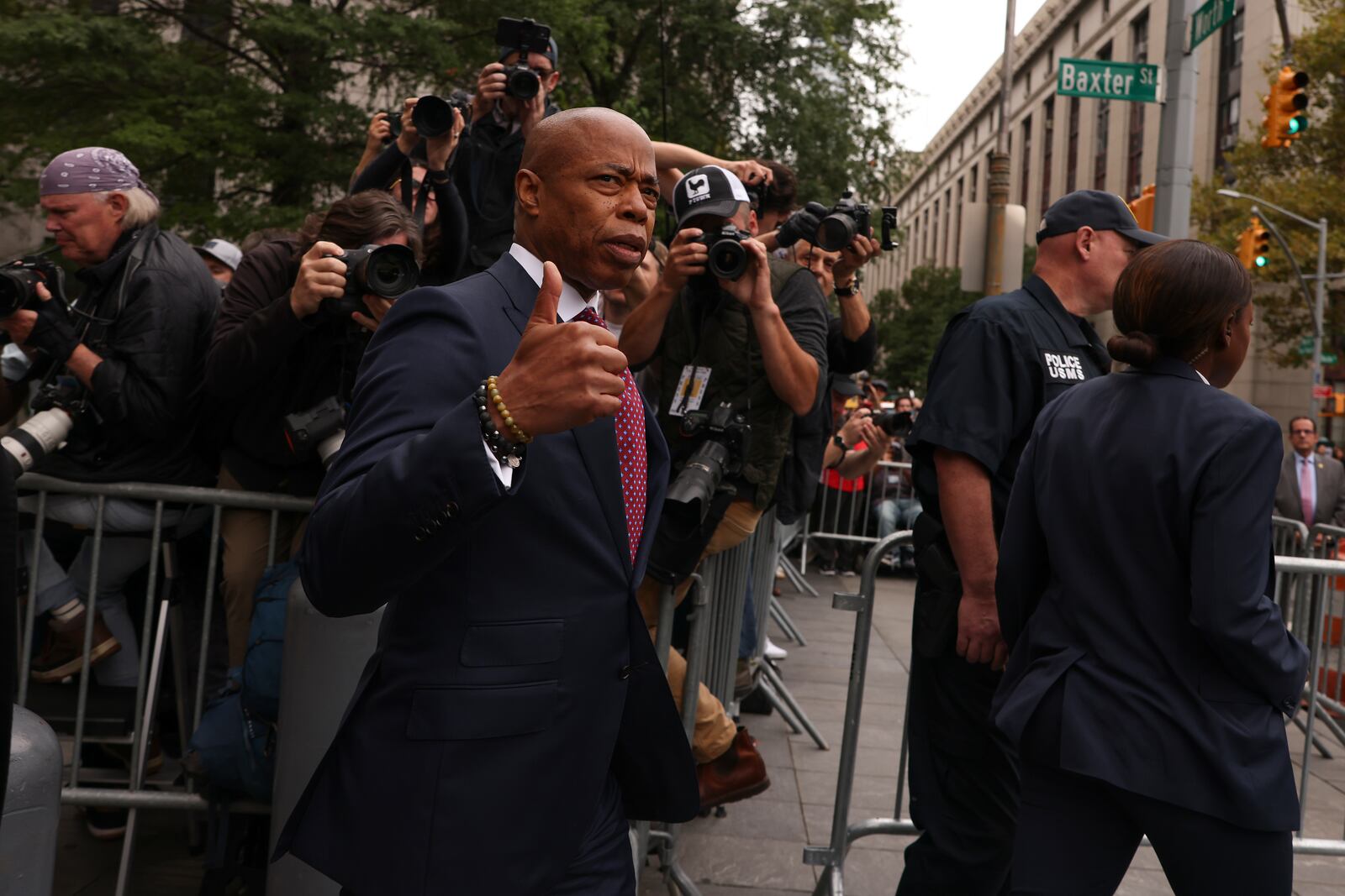 New York City mayor Eric Adams motions as he departs Manhattan federal court, Friday, Sept. 27, 2024, in New York. (AP Photo/Yuki Iwamura)