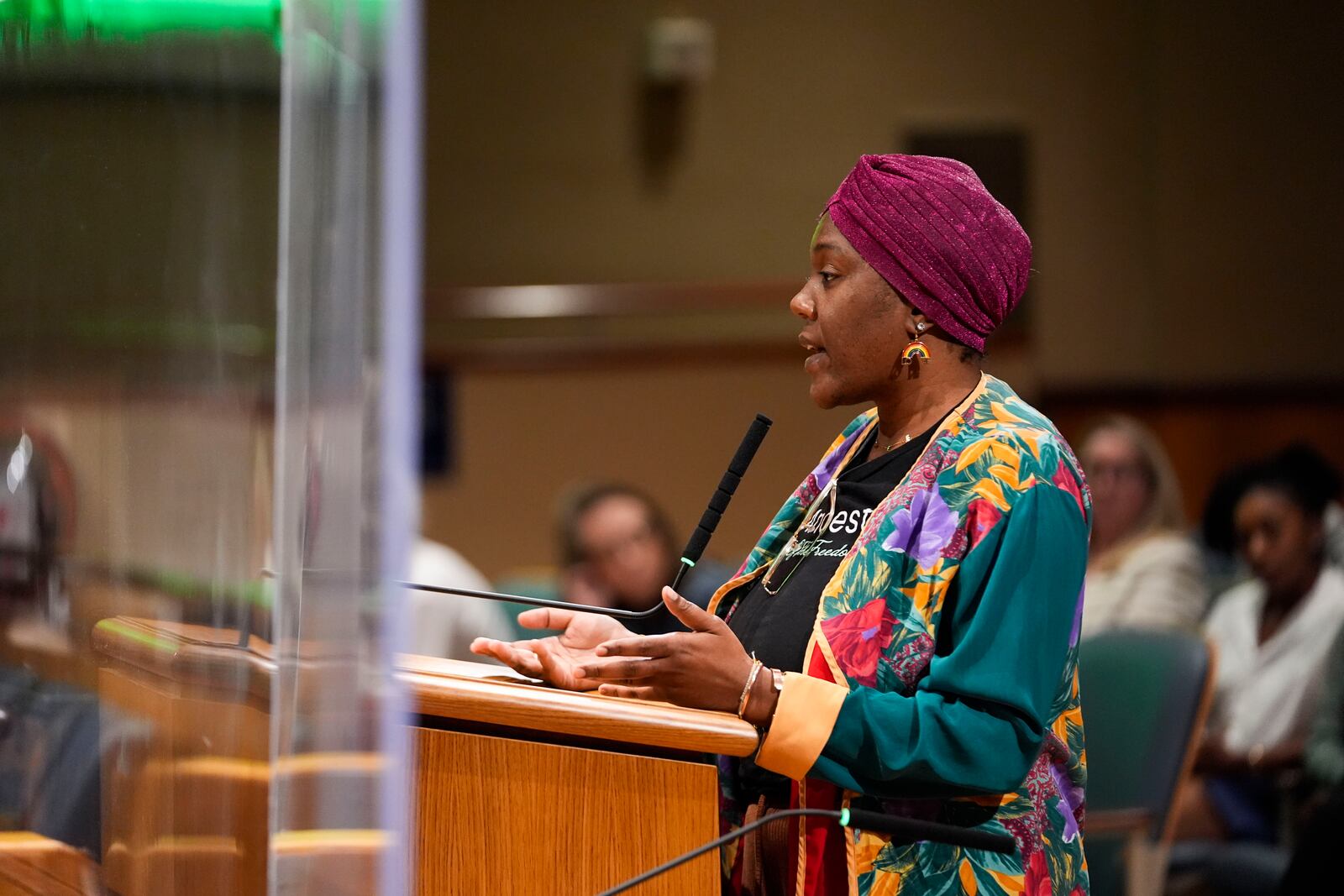 Candice Henderson-Chandler, who purchased the former home of civil rights leader Oretha Castle Haley and plans to open a museum, speaks during a city council hearing on the matter, which is opposed by Castle Haley's family, in New Orleans, Thursday, Oct. 24, 2024. (AP Photo/Gerald Herbert)