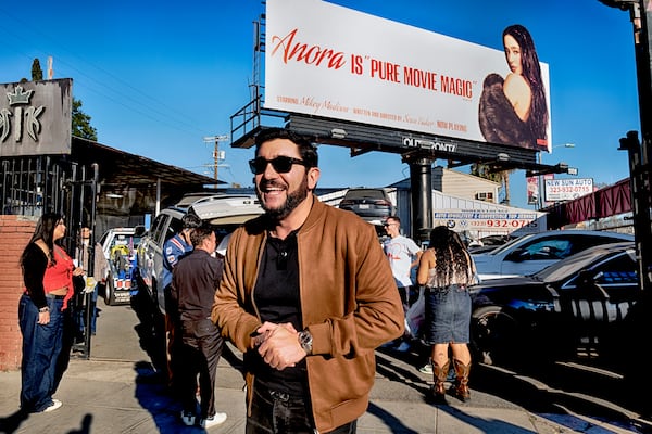 Actor Vache Tovmasyan greets fans during a merchandise Pop-Up event for the movie Anora on Saturday, Nov. 9, 2024 in Los Angeles. (AP Photo/Richard Vogel)