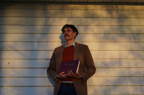 Nathan Rees, a committee member and Sacred Harp museum curator, poses for a portrait outside of The Sacred Harp Publishing Company and Museum in Carrolton, Ga., on Friday, March 21, 2025. (AP Photo/Jessie Wardarski)