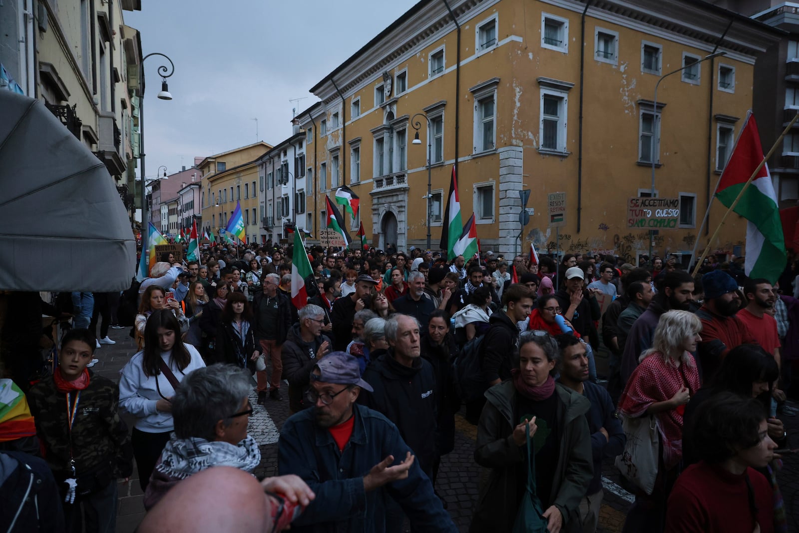 People march during a pro-Palestinians protest ahead of the Nations League soccer match between Italy and Israel, in Udine, Italy, Monday, Oct. 14, 2024. (Riccardo Modena/LaPresse via AP)