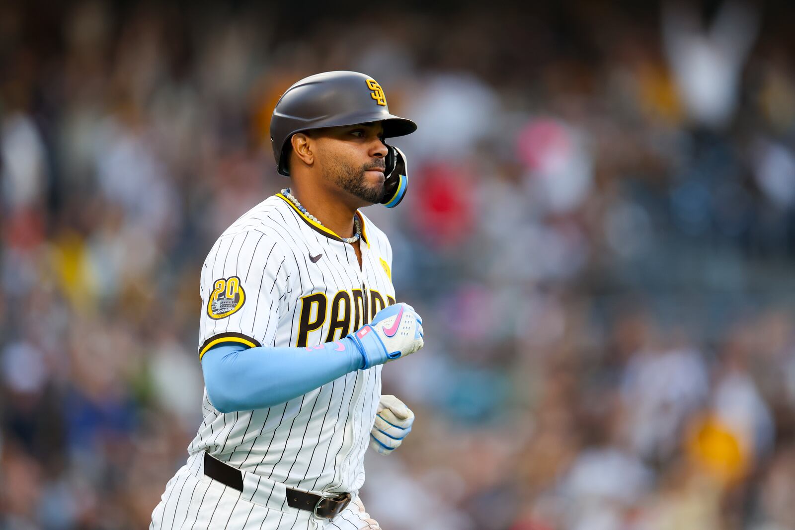 San Diego Padres' Xander Bogaerts runs after hitting a two-run home run during the second inning of a baseball game against the Chicago White Sox, Saturday, Sept. 21, 2024, in San Diego. (AP Photo/Ryan Sun)