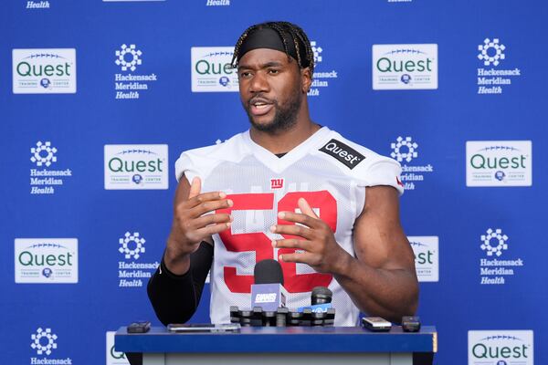 New York Giants' Bobby Okereke talks to reporters after an NFL football practice in East Rutherford, N.J., Wednesday, May 28, 2025. (AP Photo/Seth Wenig)