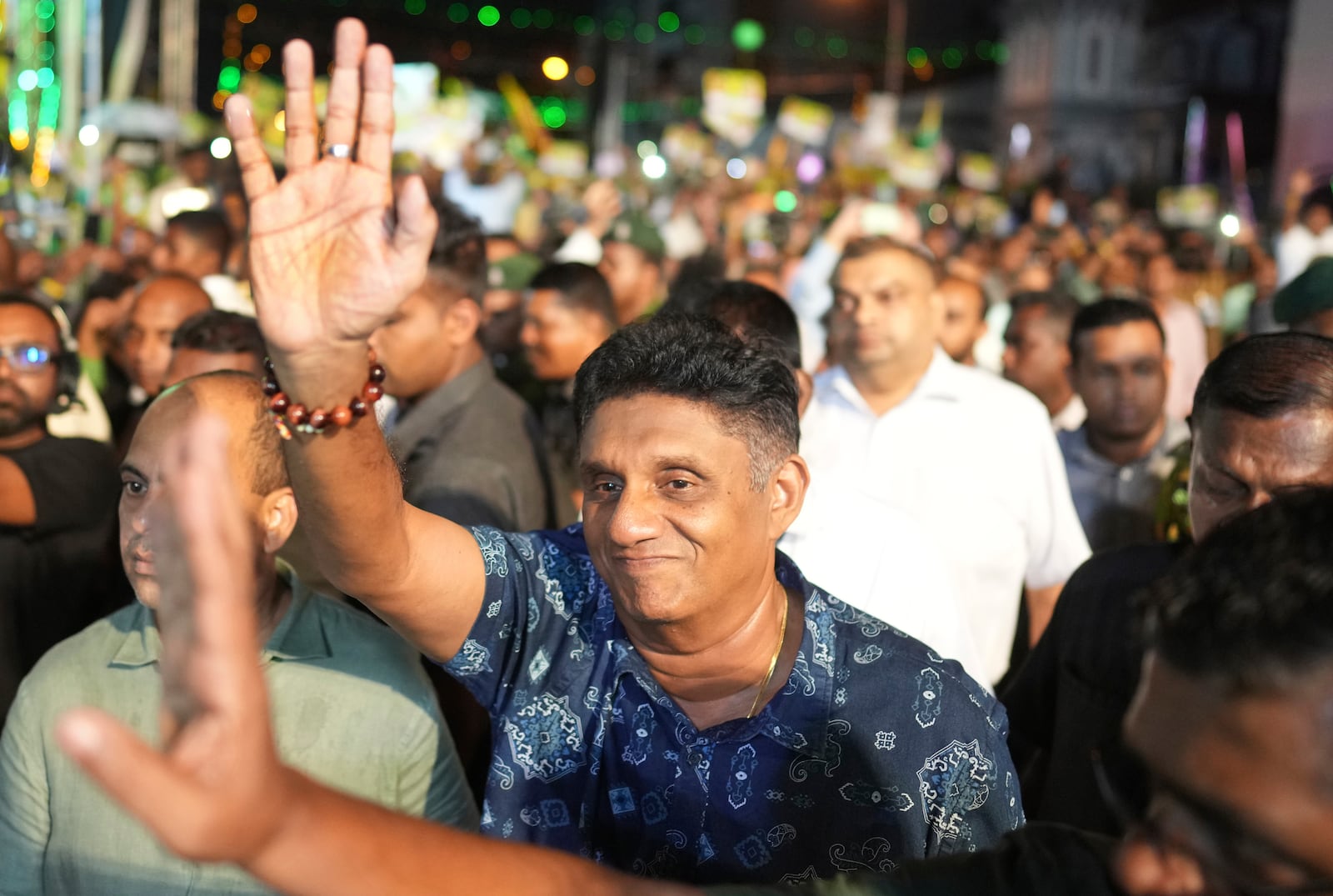 Presidential candidate and opposition leader Sajith Premadasa of the Samagi Jana Balawgaya or United People's Power party waves to supporters as he arrives for the final election rally in Colombo, Sri Lanka, Wednesday, Sept. 18, 2024. (AP Photo/Rajesh Kumar Singh)