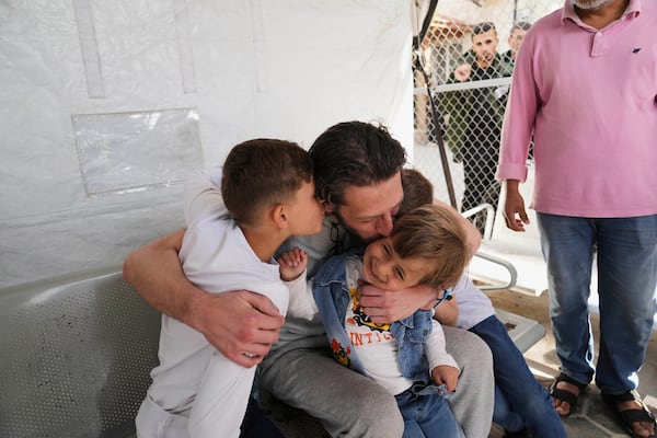 Freed Palestinian prisoner Mohammad Al-Sharif, who was detain by the Israeli army during its ground operation in the Gaza Strip, arrives at al-Aqsa Hospital in Deir al-Balah, central Gaza, after his release from an Israeli prison, Tuesday, April 29, 2025. (AP Photo/Abdel Kareem Hana)