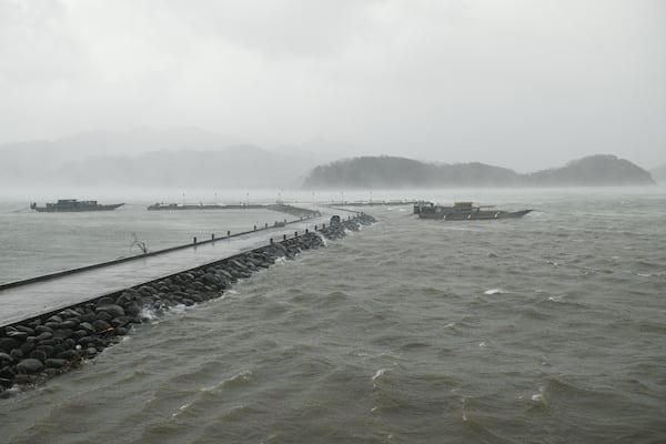 Waves batter a port as rain caused by Typhoon Usagi pours at Santa Ana, Cagayan province, northern Philippines on Thursday, Nov. 14, 2024. (AP Photo/Noel Celis)