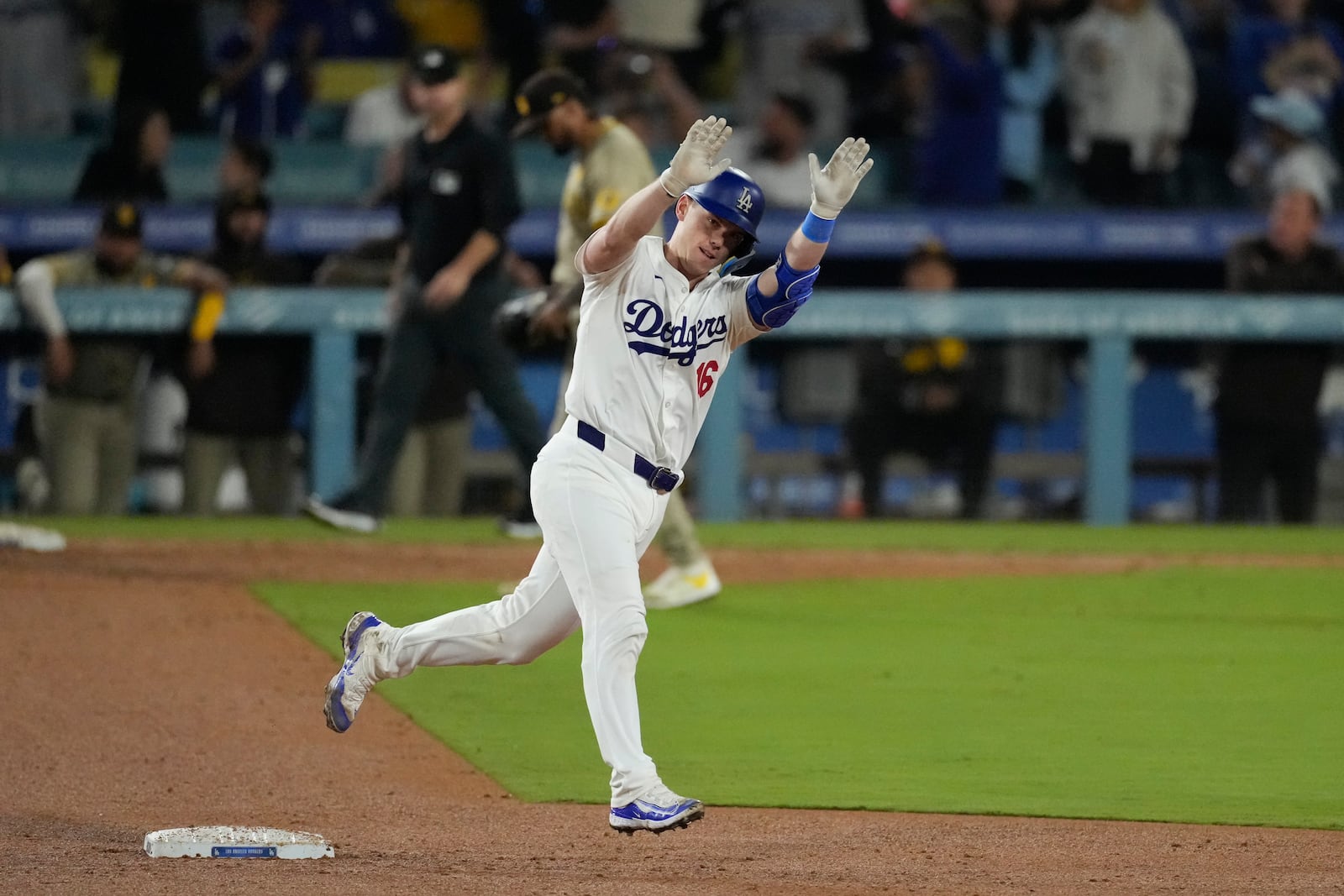 Los Angeles Dodgers' Will Smith celebrates his two-run home run during the seventh inning of a baseball game against the San Diego Padres, Thursday, Sept. 26, 2024, in Los Angeles. (AP Photo/Mark J. Terrill)