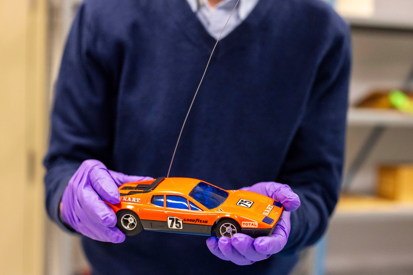 Christopher Bensch, chief curator at The Strong National Museum of Play, holds one of the toys that is a finalist for the 2024 Toy Hall of Fame, Tuesday, Oct. 15, 2024, in Rochester, N.Y. (AP Photo/Lauren Petracca)