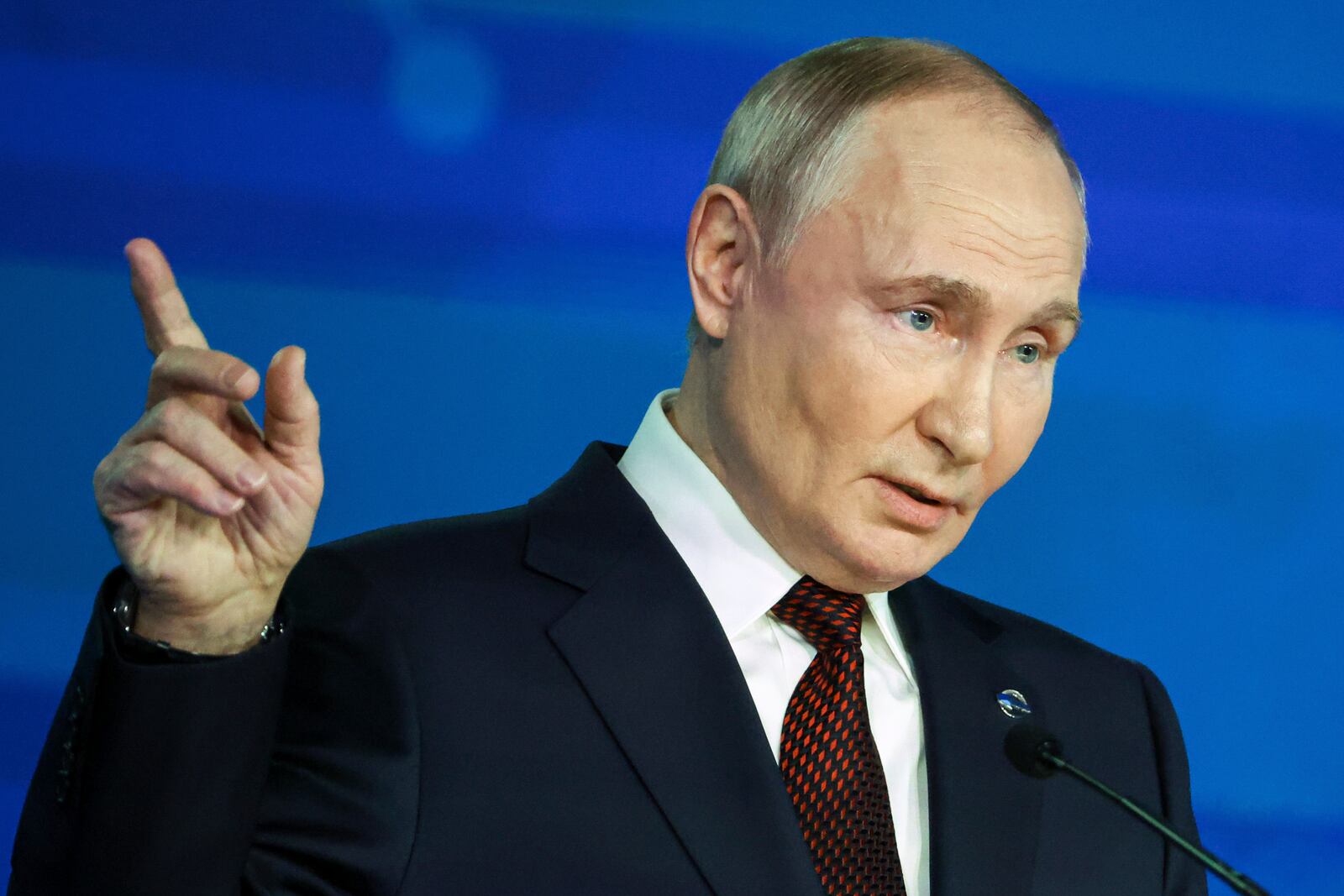 Russian President Vladimir Putin points during a meeting with foreign policy experts at the Valdai Discussion Club in the Black Sea resort of Sochi, Russia, Thursday, Nov. 7, 2024. (Maxim Shipenkov/Pool Photo via AP)