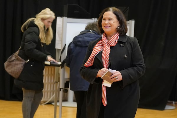 Sinn Fein leader Mary Lou McDonald walks to cast her vote at Deaf Village Ireland (DVI) on the Navan Road, in Dublin, as voters go to the polls in the 2024 General Election in Ireland, Friday Nov. 29, 2024. (Niall Carson/PA via AP)