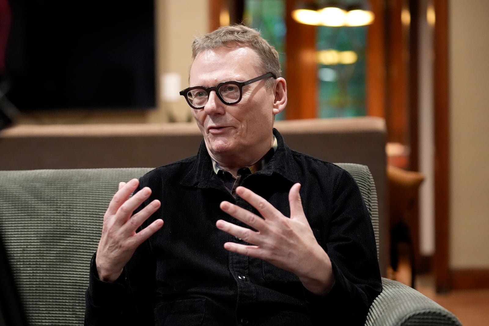 Nobel prize winner in Economics, James A. Robinson, responded to a question during an interview with The Associated Press at his home in the Hyde Park neighborhood of Chicago, Monday, Oct. 14, 2024. (AP Photo/Charles Rex Arbogast)