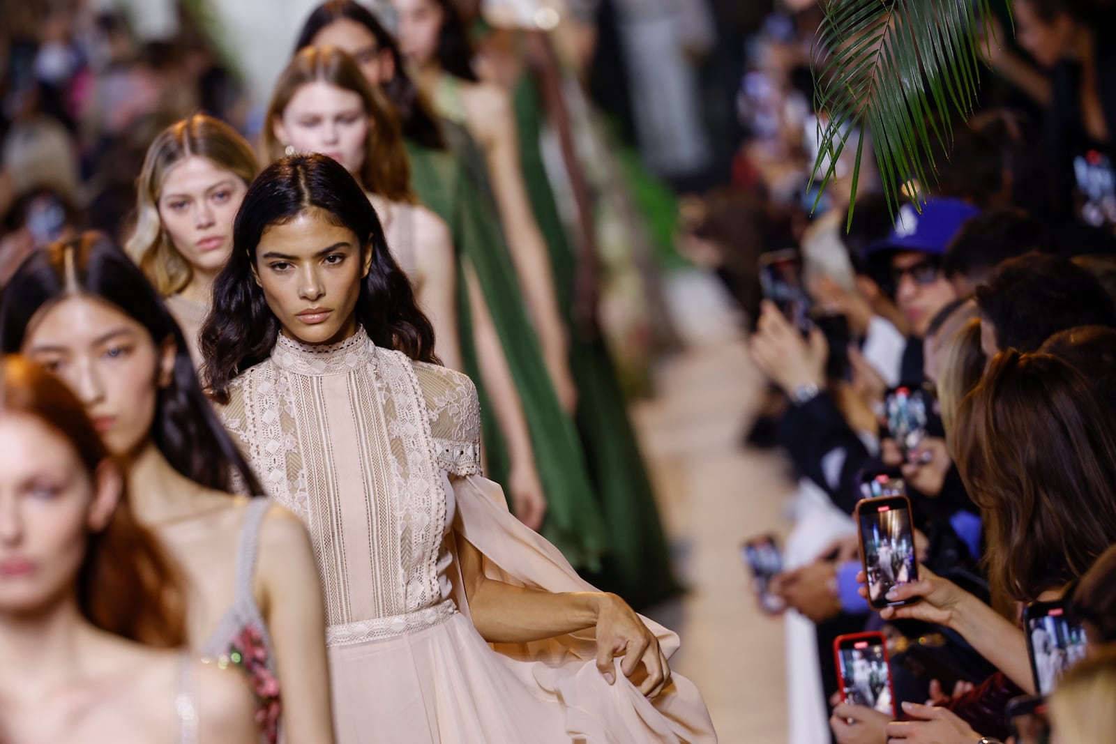 Models wear creations as part of the Elie Saab Spring/Summer 2025 collection presented Saturday, Sept. 28, 2024, in Paris. (Photo by Vianney Le Caer/Invision/AP)