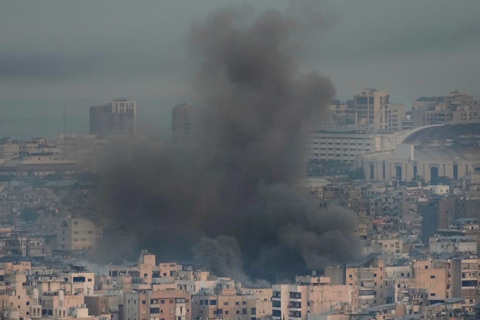 Smoke rise from Israeli airstrikes on Dahiyeh, Beirut's southern suburbs, Lebanon, Wednesday, Oct. 16, 2024. (AP Photo/Hussein Malla)