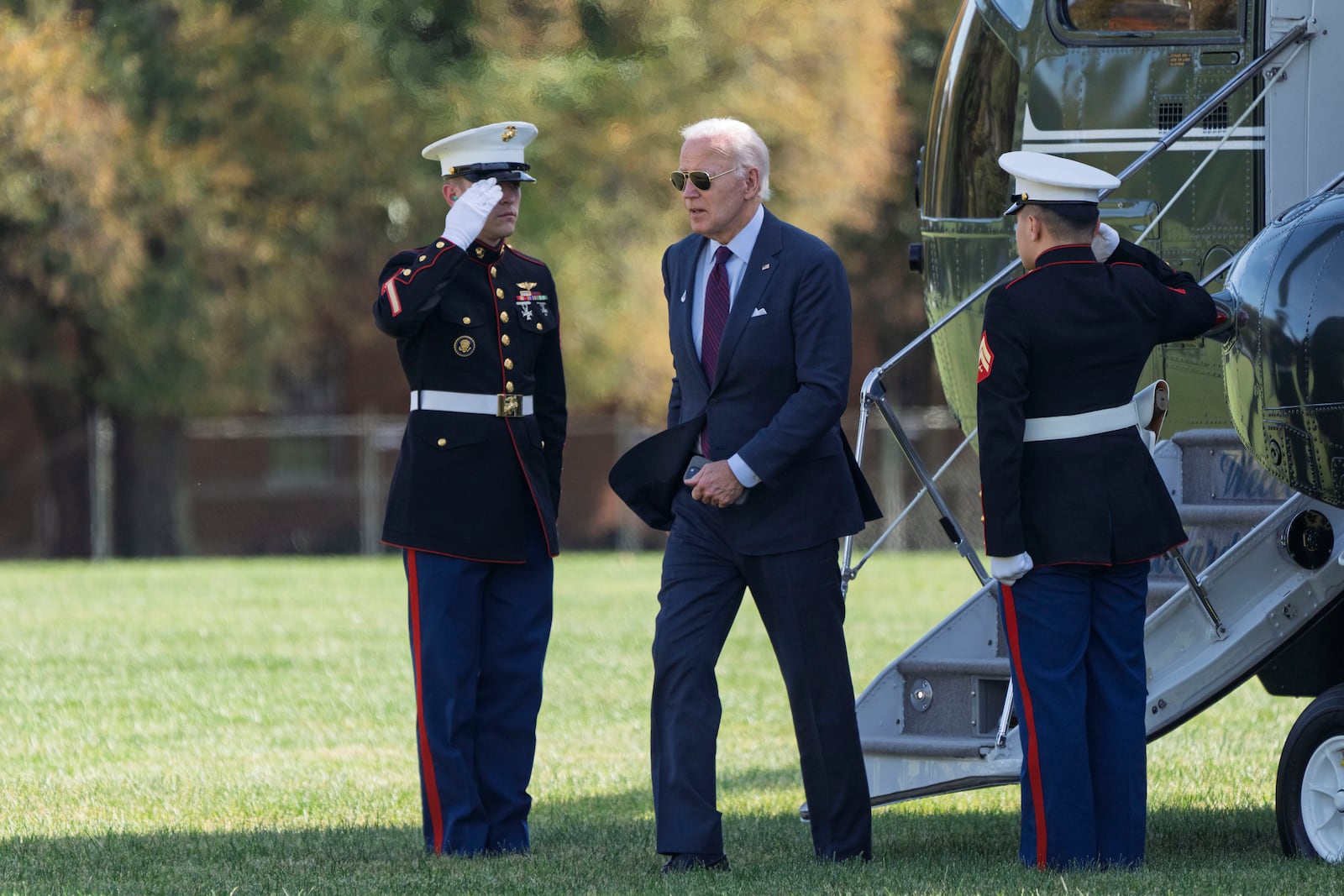 President Joe Biden walks from Marine One as he arrives at Fort McNair in Washington, Monday, Oct. 28, 2024. (AP Photo/Ben Curtis)