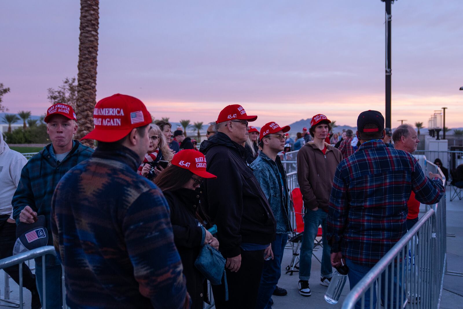 People wait in line for a campaign rally for Republican presidential nominee former President Donald Trump at Lee's Family Forum, Thursday, Oct. 31, 2024, in Henderson, Nev. (AP Photo/Evan Vucci)