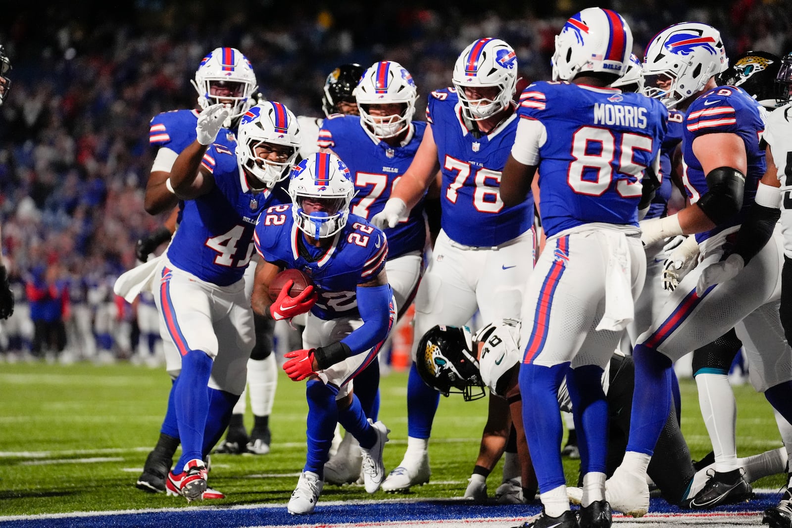 Buffalo Bills running back Ray Davis (22) scores a rushing touchdown against the Jacksonville Jaguars during the second half of an NFL football game Monday, Sept. 23, 2024, in Orchard Park, NY. (AP Photo/Steven Senne)